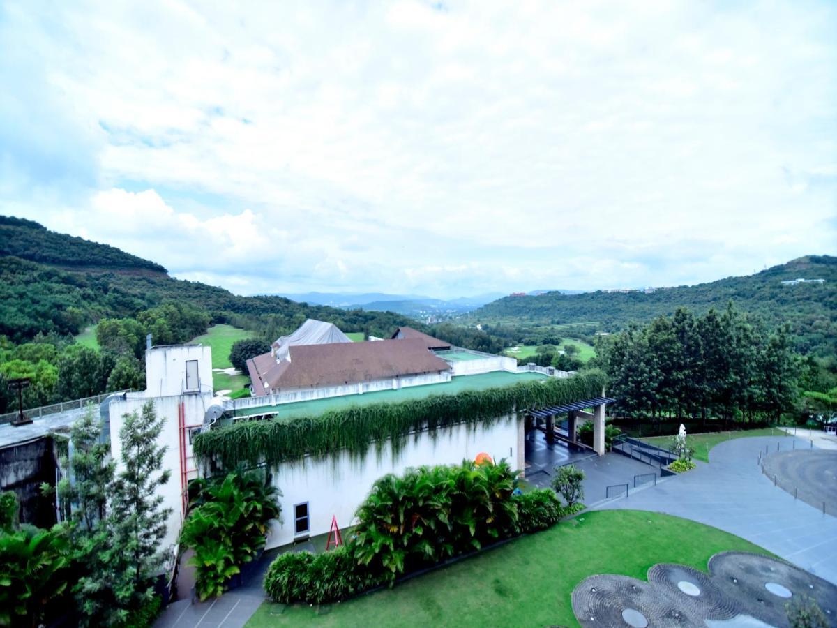 Oxford Golf Resort Pirangut Bagian luar foto
