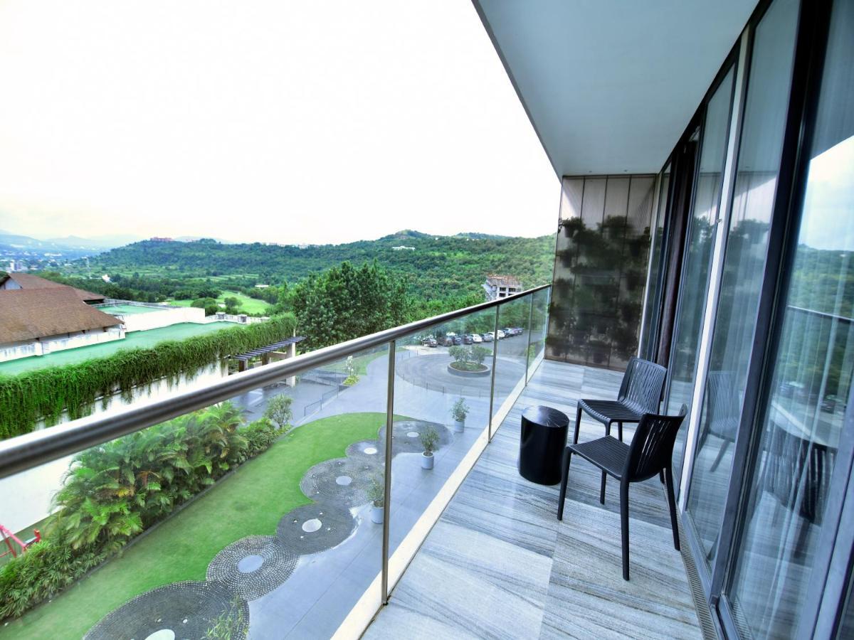 Oxford Golf Resort Pirangut Bagian luar foto