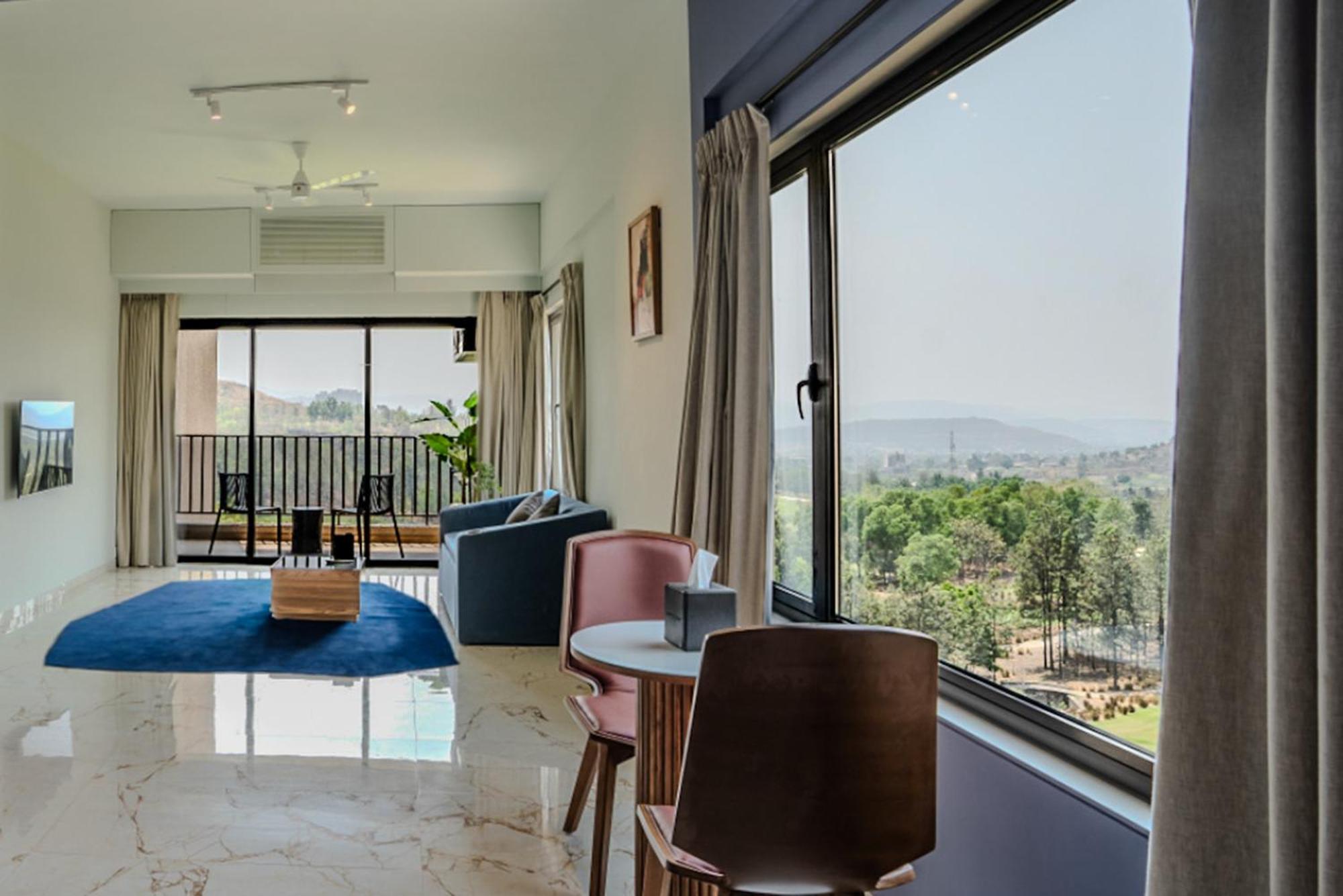 Oxford Golf Resort Pirangut Bagian luar foto