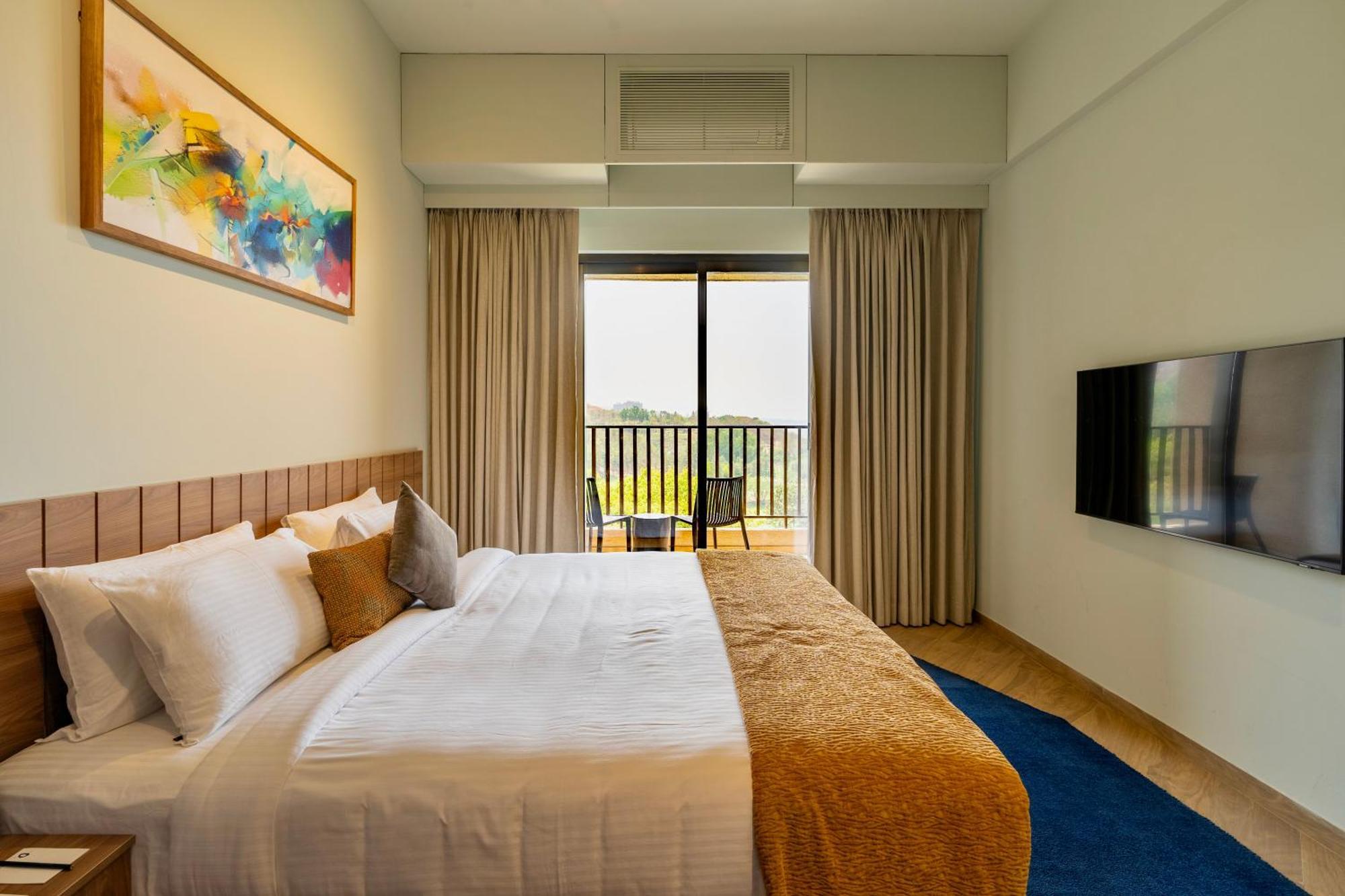 Oxford Golf Resort Pirangut Bagian luar foto